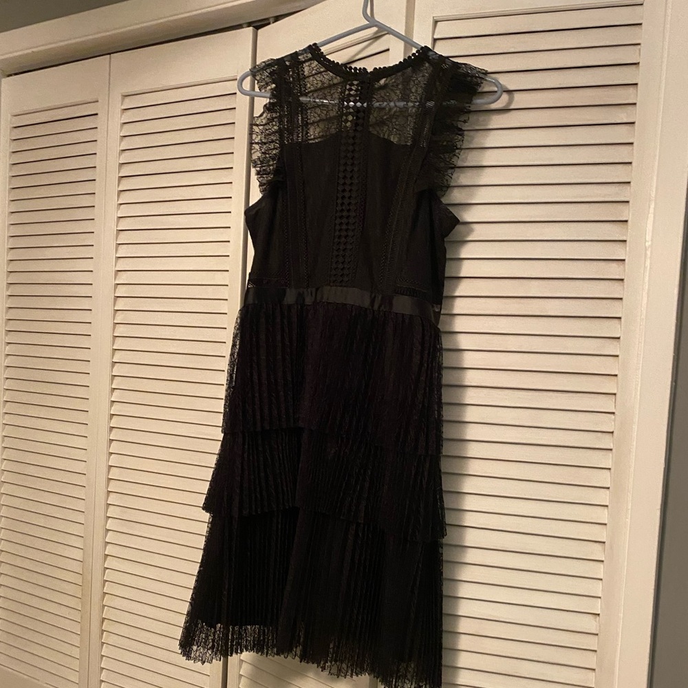 Woman’s Black Lace Dress